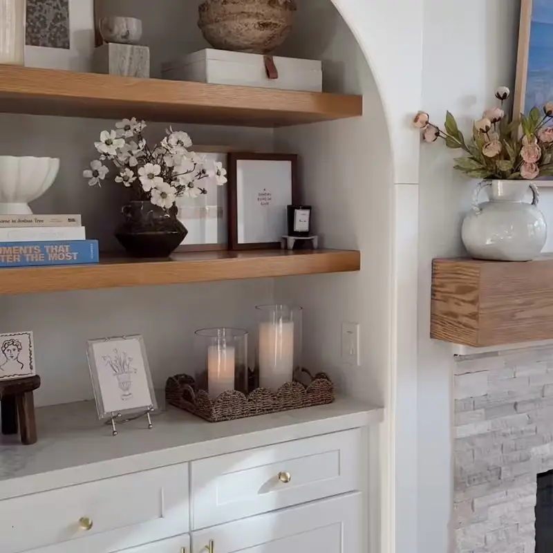 Timeless home decor and shelf styling in a neutral living space